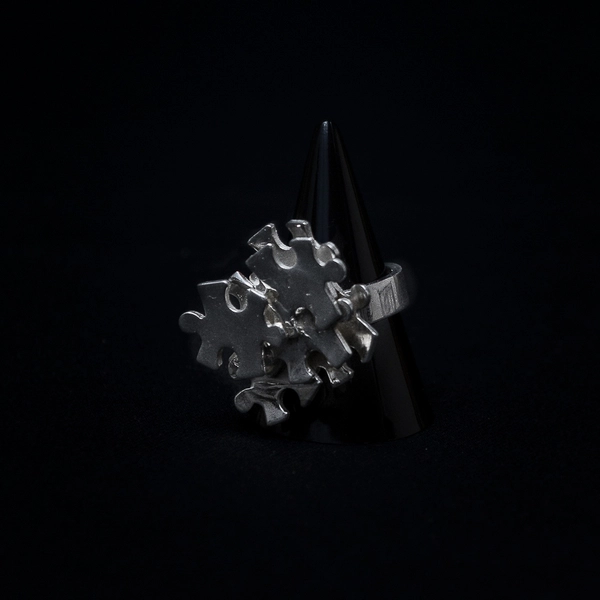 bague tas de pièces de puzzle